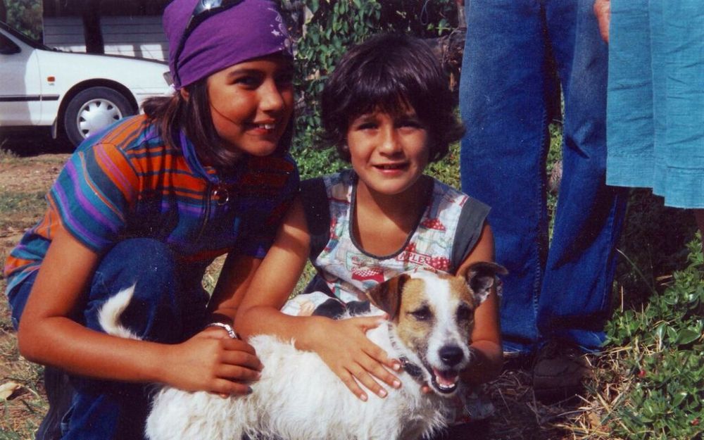 Photo of Clare and Ruby bonding with the chandler's pet dog