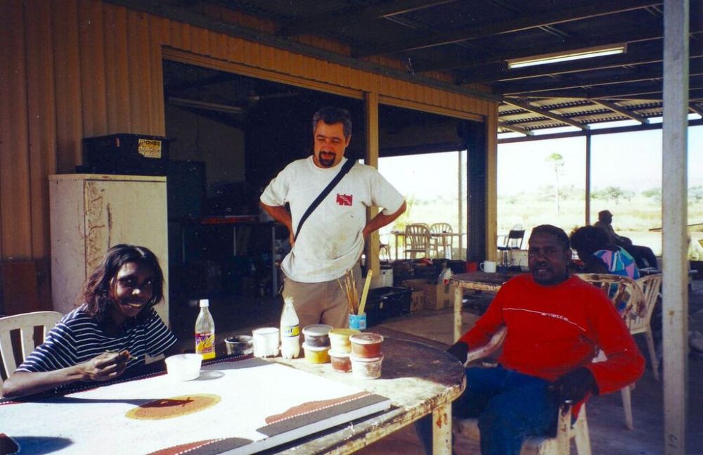 One of the artists at work, with Mark Nodea (right)