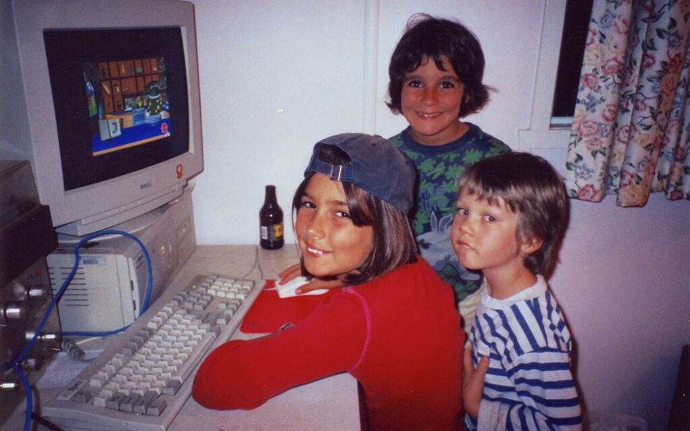 Photo of Ruby, Clare and Seamus playing computer games