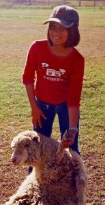 Photo of Ruby holding a sheep